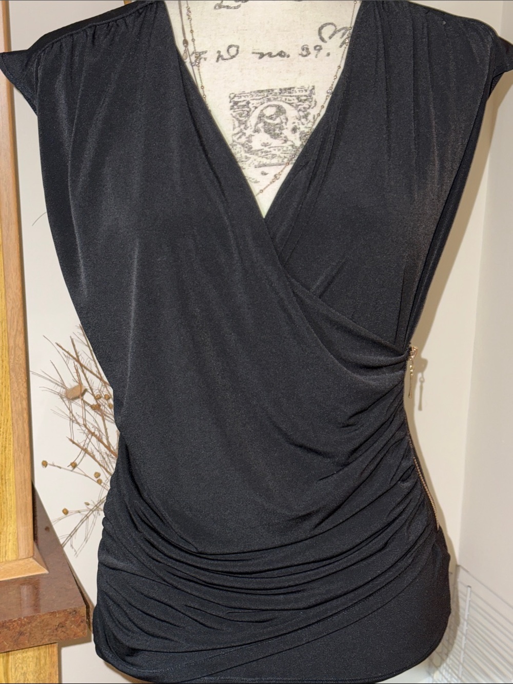 Women’s Black Sleeveless Wrap-Style Top